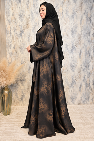 Side view of black open abaya with floral satin print, matching inner dress and coordinated scarf