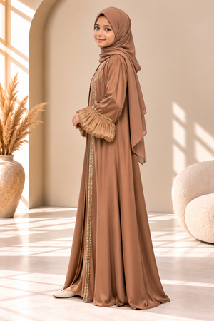 Side view of the Mocha Luxe abaya featuring voluminous organza balloon sleeves and gathered cuffs.