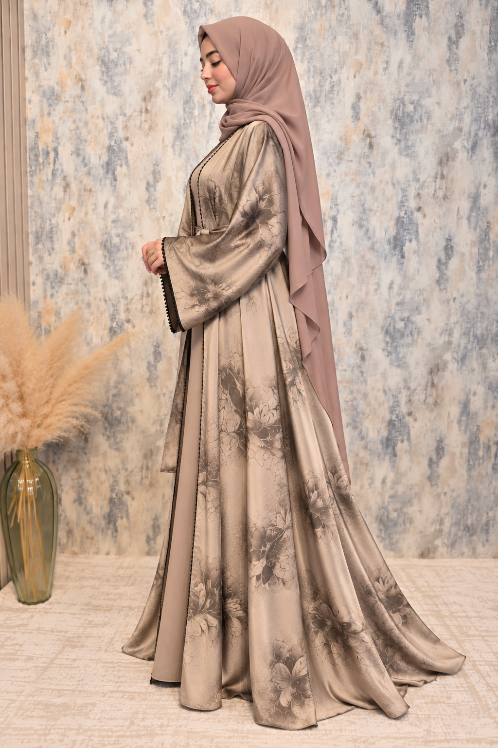 Side view of beige open abaya with floral print, matching inner dress and coordinated scarf