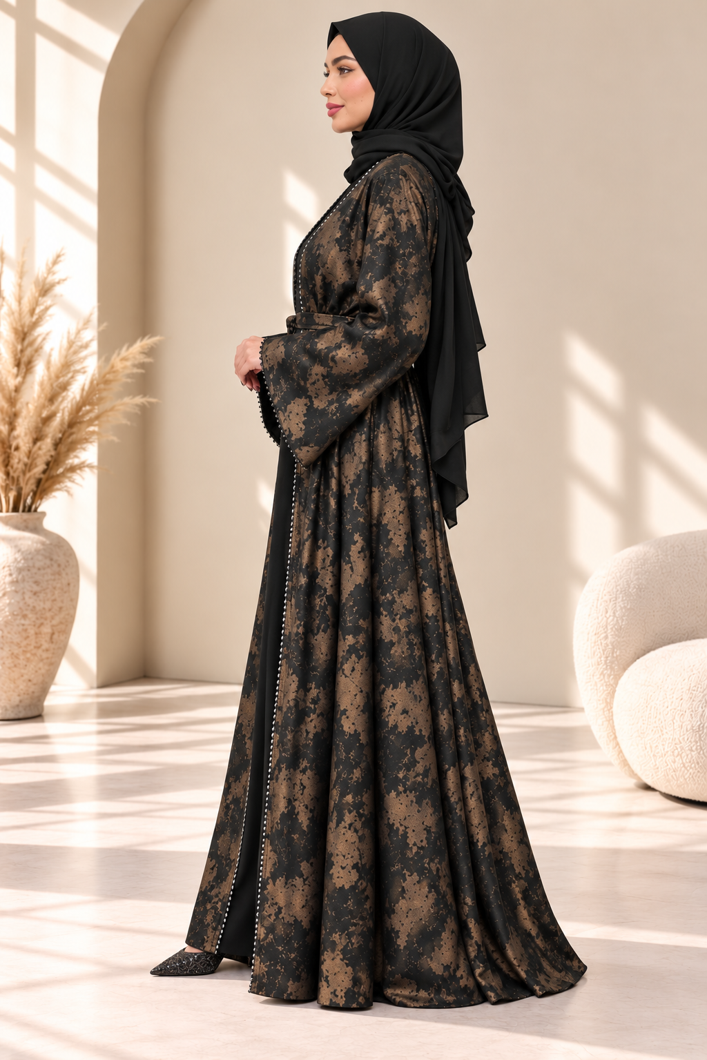 Side view of black Hafizah printed open abaya highlighting its elegant silhouette