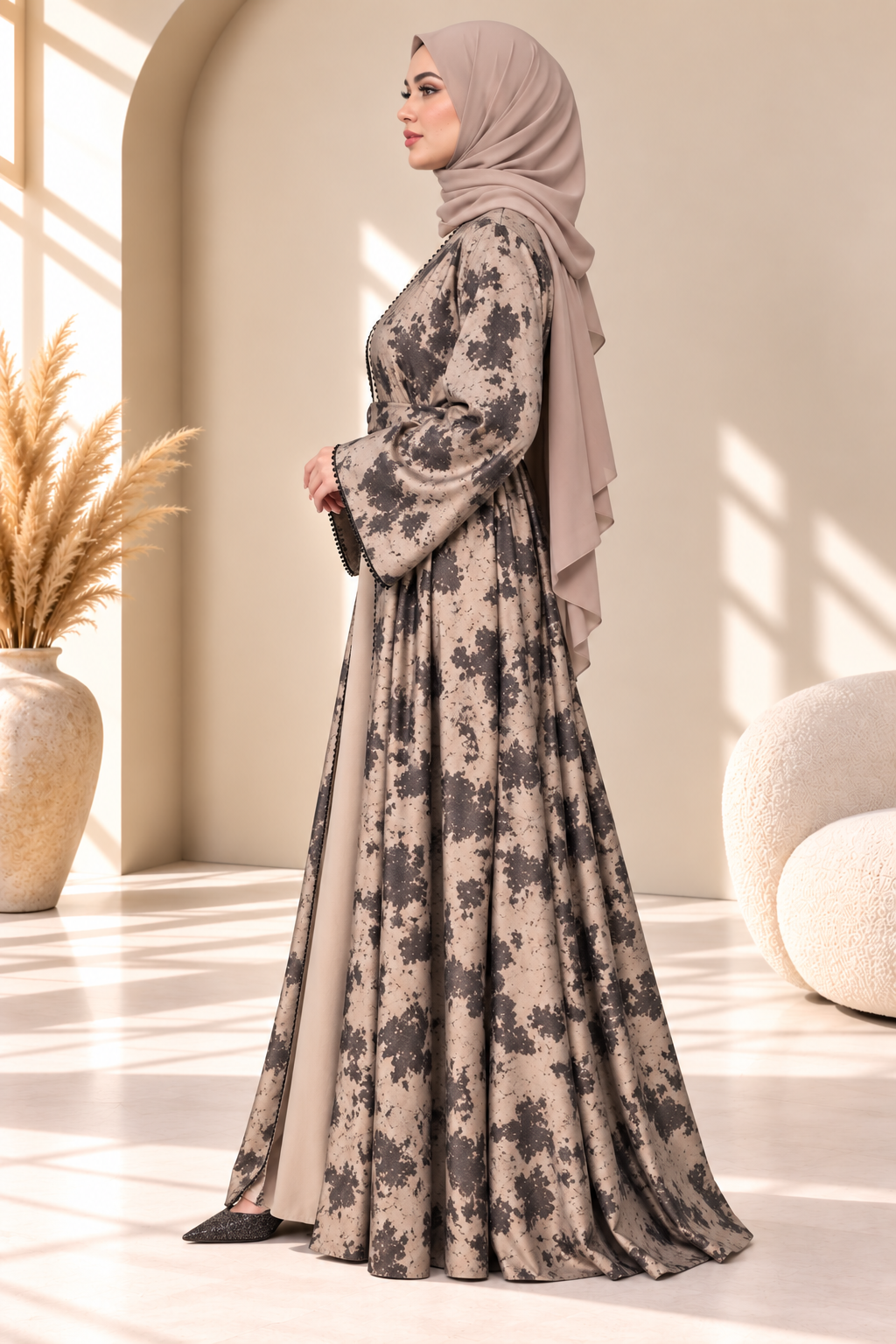 Side view of brown Hafizah printed open abaya highlighting its elegant silhouette