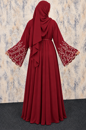 Back view of a premium maroon open abaya with floral embroidered sleeve detailing