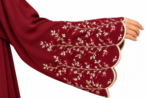 Hand view of a premium maroon open abaya with floral embroidered sleeve detailing