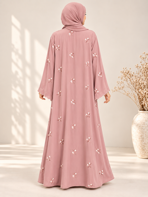 Back view of pink open abaya featuring delicate floral embroidery and matching scarf